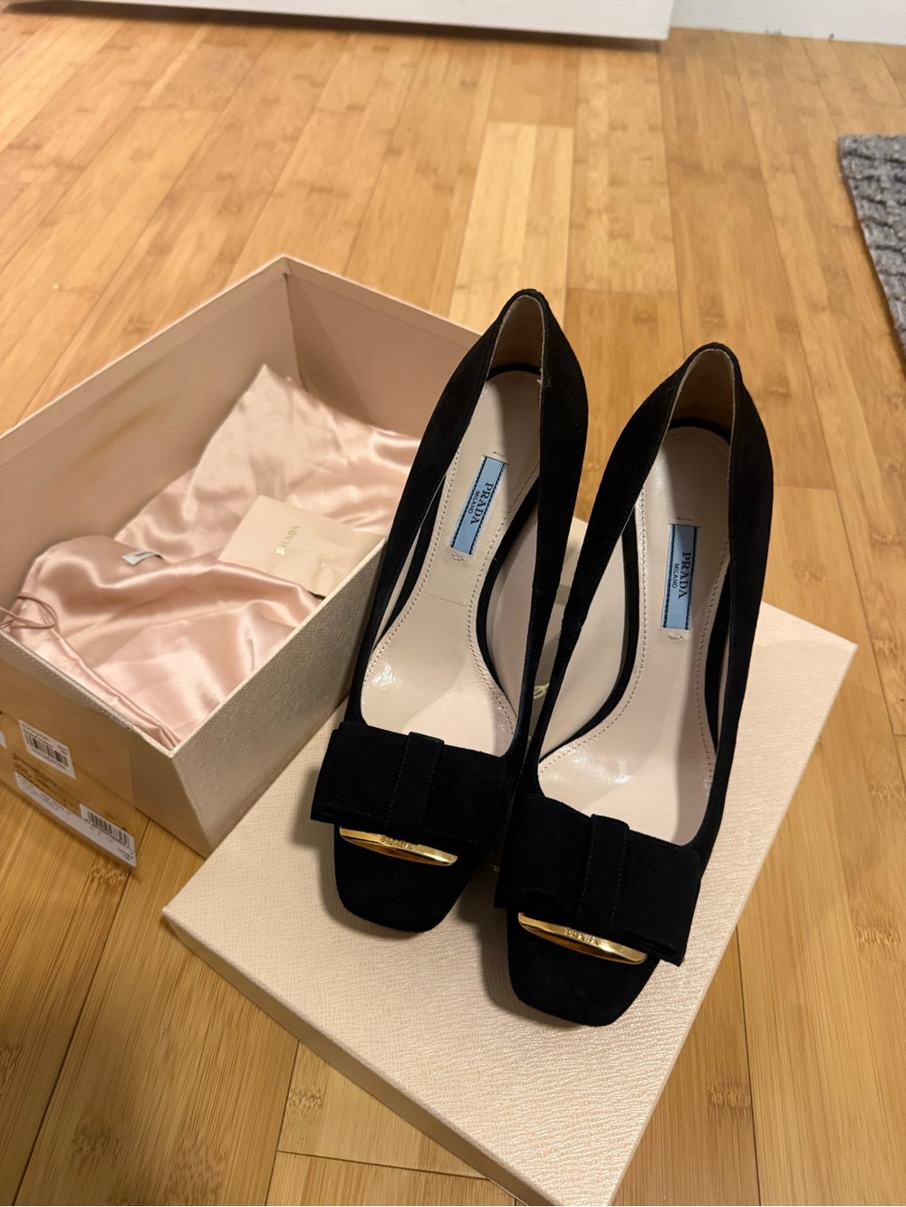 Prada Black Suede Bow Pumps with Gold Accent